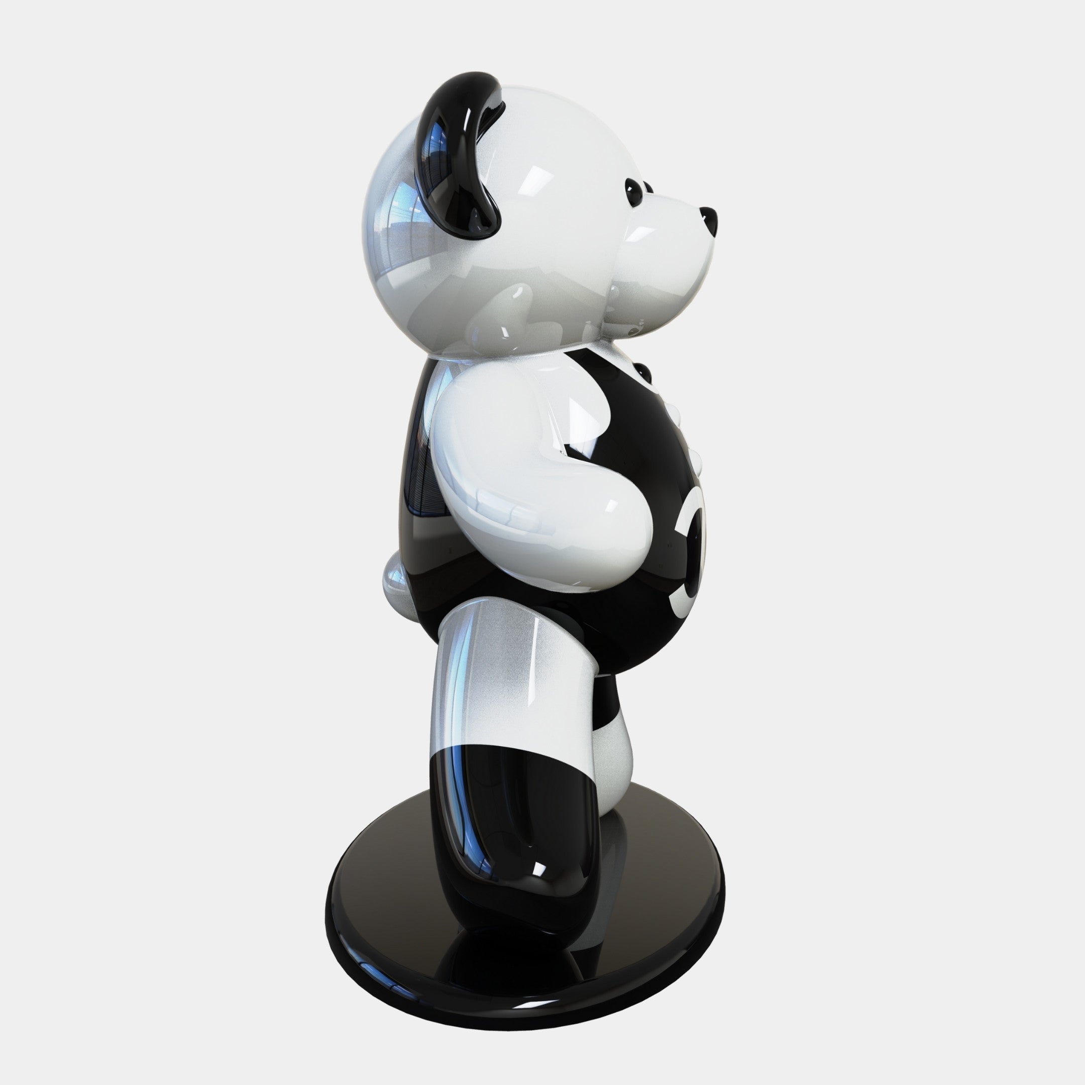 The Gacko Channel Bear Sculpture by Giant Sculptures is a glossy black and white masterpiece standing 165cm tall on a round base, showcasing pop art style with its luxurious side profile and slightly tilted head.