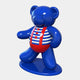 The Gacko Sailor Bear Sculpture by Giant Sculptures is a 165cm blue teddy figurine, sporting a red and white striped shirt with red suspenders, standing on its base. It has a glossy finish and cartoonish appeal inspired by nautical pop art.