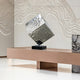 The same cube sculpture displayed in a contemporary interior, blending with neutral-toned furniture.