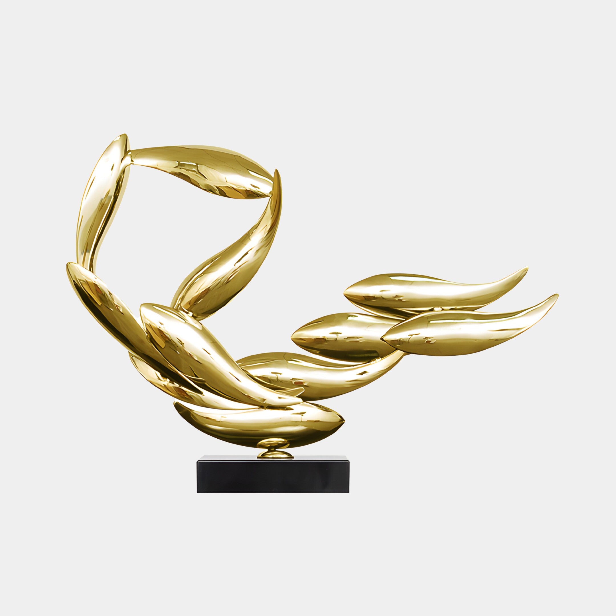 The Breeze Gold Organic Abstract Steel Sculpture by Giant Sculptures features leaf-like curves on a shiny gold finish, mounted on a small black rectangular base. This 50cm piece exudes modern arts elegance with its organic, intertwined design.