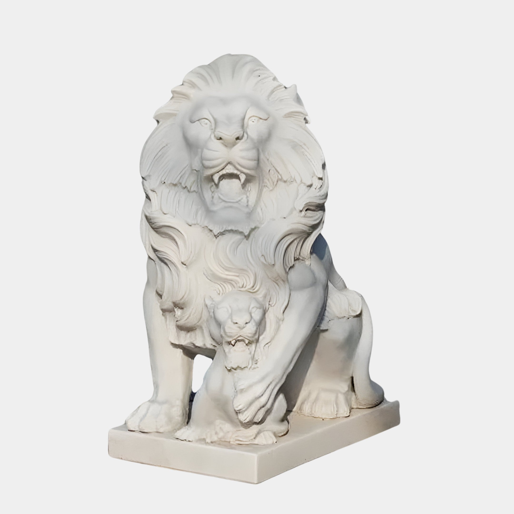 The Giant Lion With Cub Marble Outdoor Sculpture by Giant Sculptures stands majestically on a pedestal, depicting a roaring lion with a detailed mane. This luxury garden art features the lion protectively placing one paw over its cub, and is intricately carved to showcase dynamic expressions and textures.