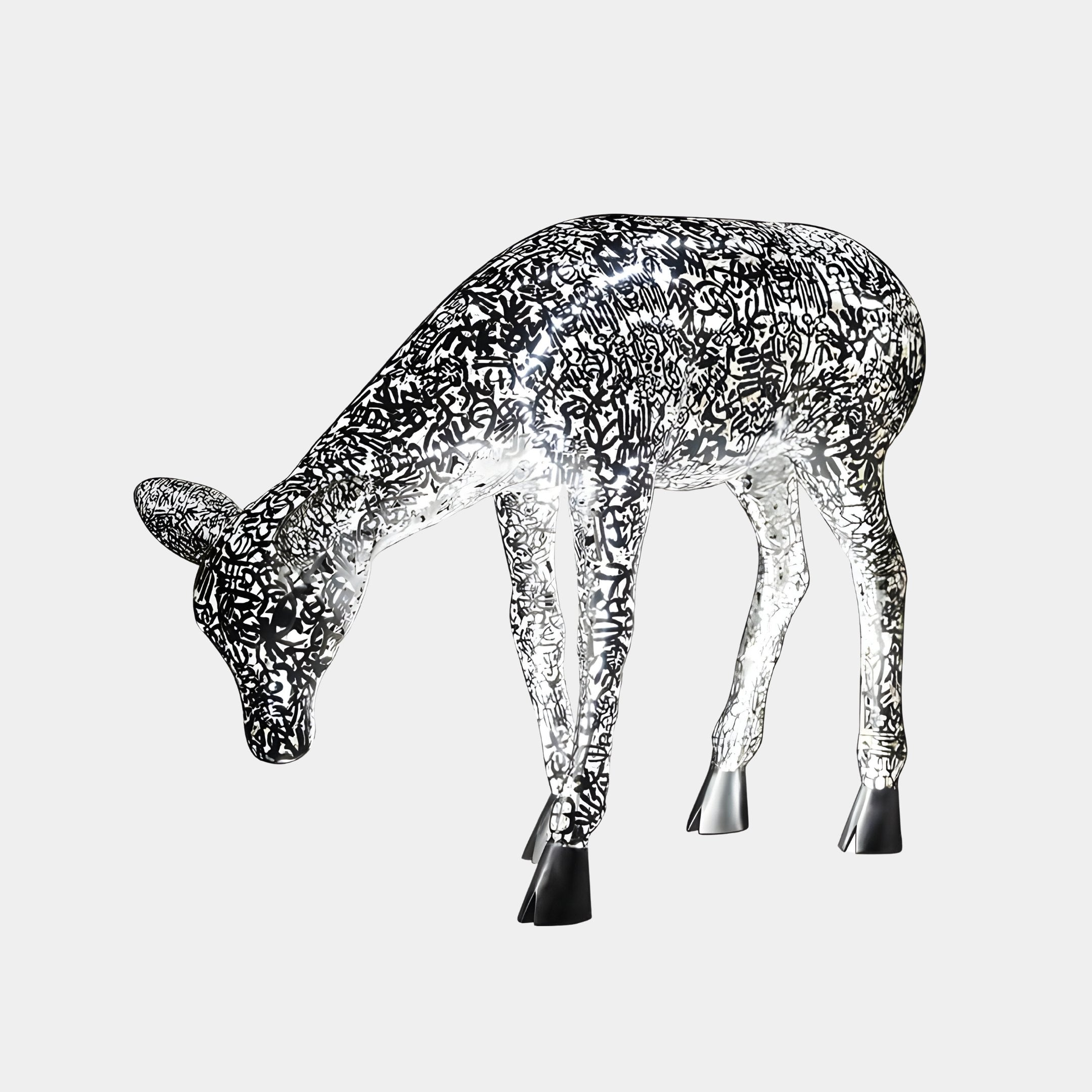 A magnificent Luminous Deer Silver Steel LED Sculpture by Giant Sculptures, standing at 90cm, features intricate black and white patterns and a modern artistic design. Crafted from silver stainless steel, it accentuates the deer's unique translucent texture and form against a plain background.