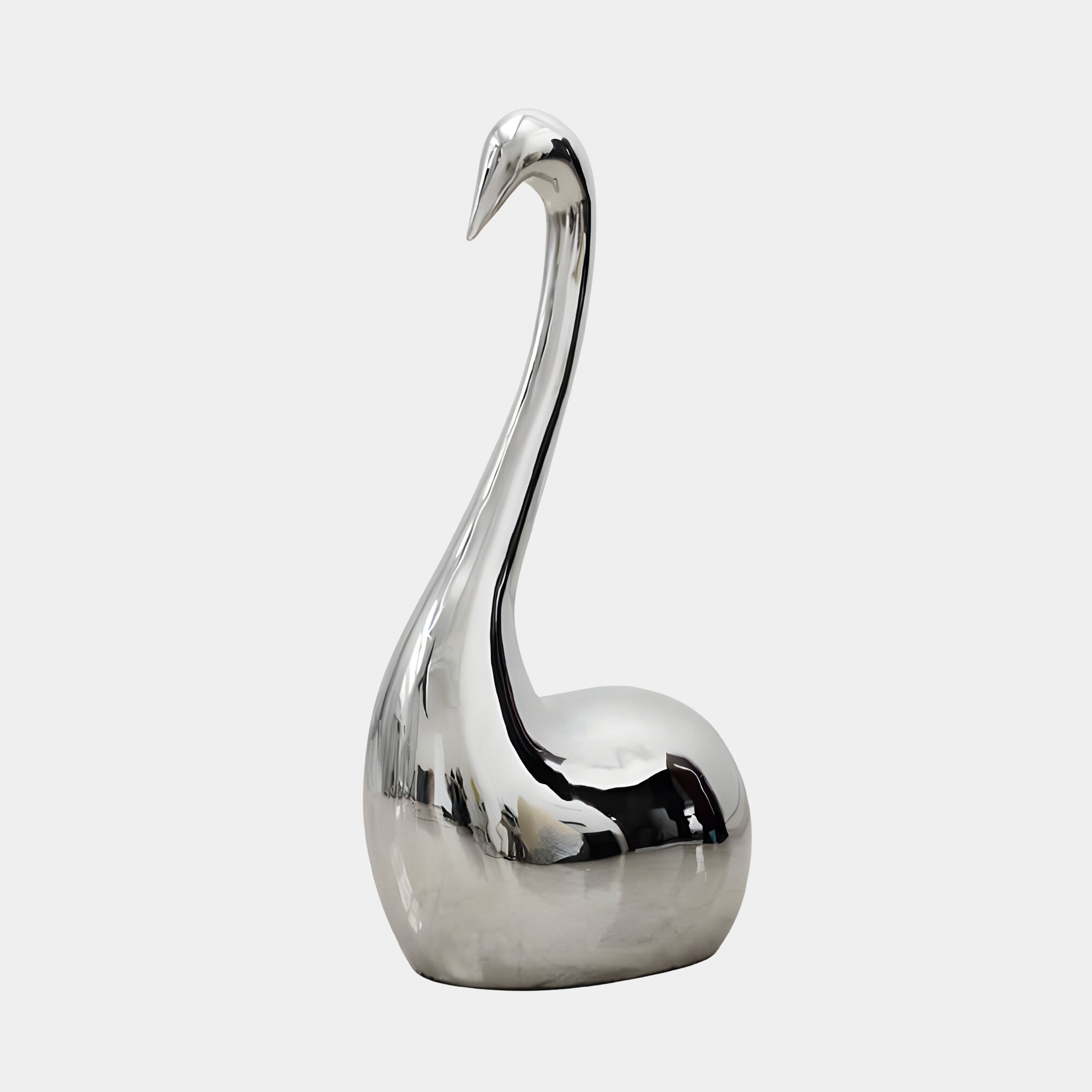 The Swan Silver Abstract Steel Sculpture by Giant Sculptures, available in 80/108cm sizes, embodies contemporary elegance with its polished metallic surface and sleek, elongated neck. Set against a plain white background, this sculpture highlights its shiny, mirror-like finish.