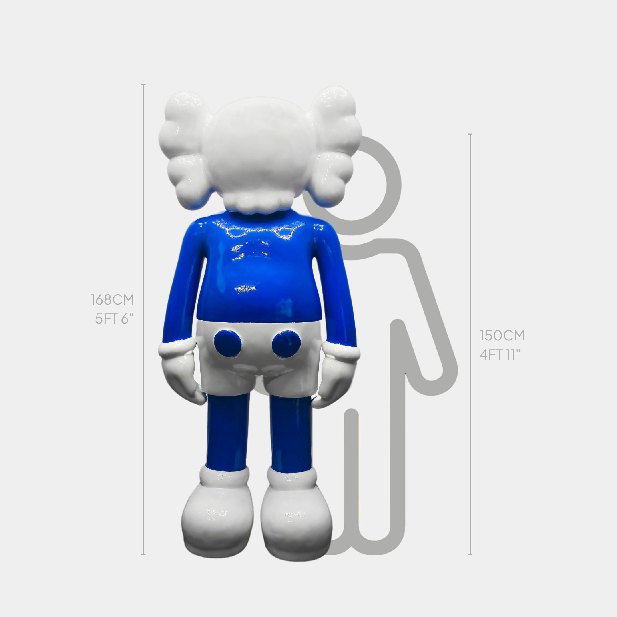 The Ex-Display Deep Blue Iconify Sculpture from Giant Sculptures is a modern design piece with playful proportions, featuring a blue and white cartoonish figure standing confidently at 168 cm (5 ft 6 in) in large gloves and shorts, against a 150 cm silhouette backdrop.