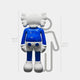 The Ex-Display Deep Blue Iconify Sculpture from Giant Sculptures is a modern design piece with playful proportions, featuring a blue and white cartoonish figure standing confidently at 168 cm (5 ft 6 in) in large gloves and shorts, against a 150 cm silhouette backdrop.