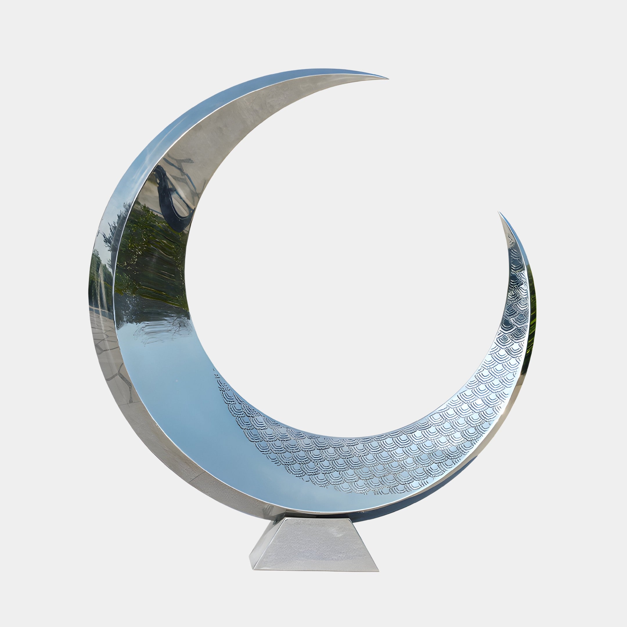 A crescent-shaped stainless steel outdoor sculpture with a sleek, polished finish, ideal for enhancing modern gardens or courtyard spaces.