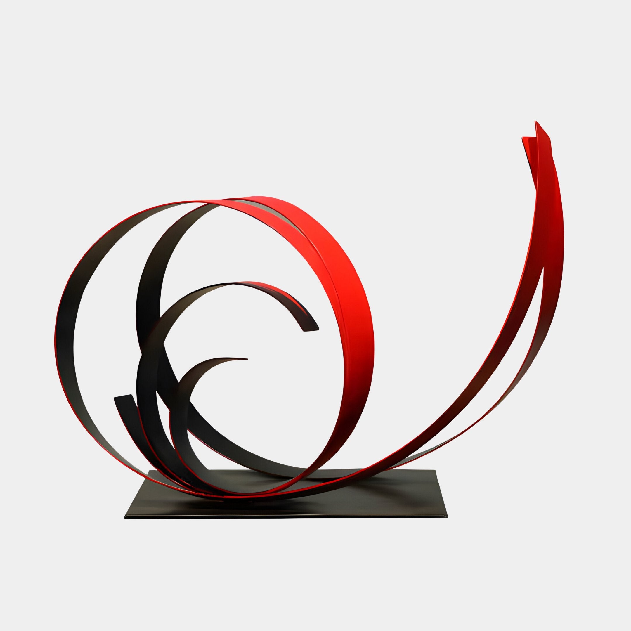 Introducing the Ribbon Red VI Abstract Steel Sculpture - 67cm by Giant Sculptures, a contemporary piece featuring intertwining loops of black and red metal crafted into a flowing abstract form. This exquisite stainless steel sculpture is elegantly positioned on a flat, rectangular base against a plain white background.