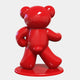 The Gacko Porsche Bear Sculpture - 165cm by Giant Sculptures is a glossy, red, bear-shaped piece on a circular base with smooth curves and a shiny finish, embodying Pop Arts playful, modern style.