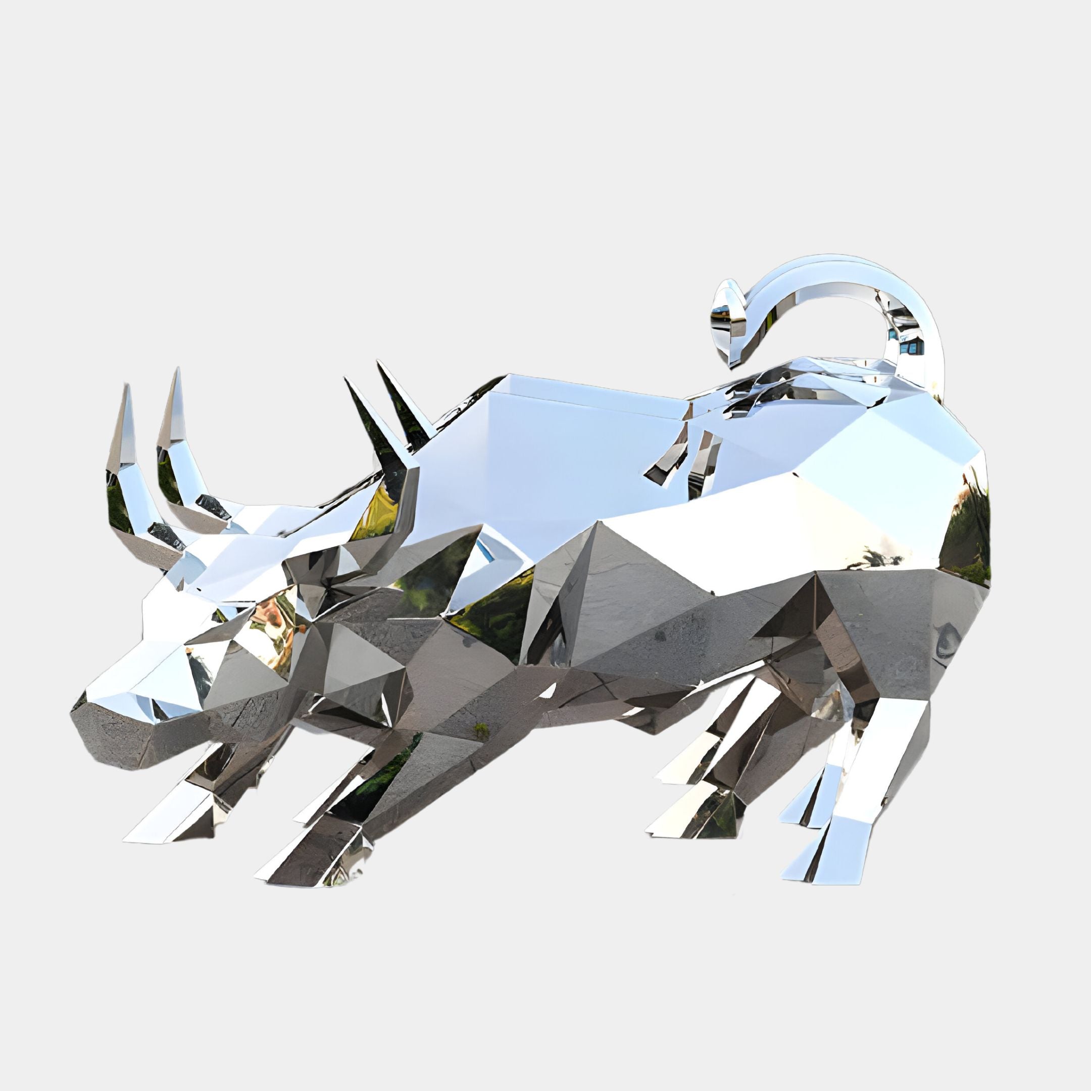 The Toro Bull Geometric Steel Outdoor Sculpture, crafted by Giant Sculptures, is a striking piece made from steel, showcasing a silver hue and polygonal design. This modern artistic creation features a shiny, reflective surface and depicts the bull in a dynamic charging stance against a plain white background. Standing at 193 cm tall, it makes for an impressive outdoor installation.