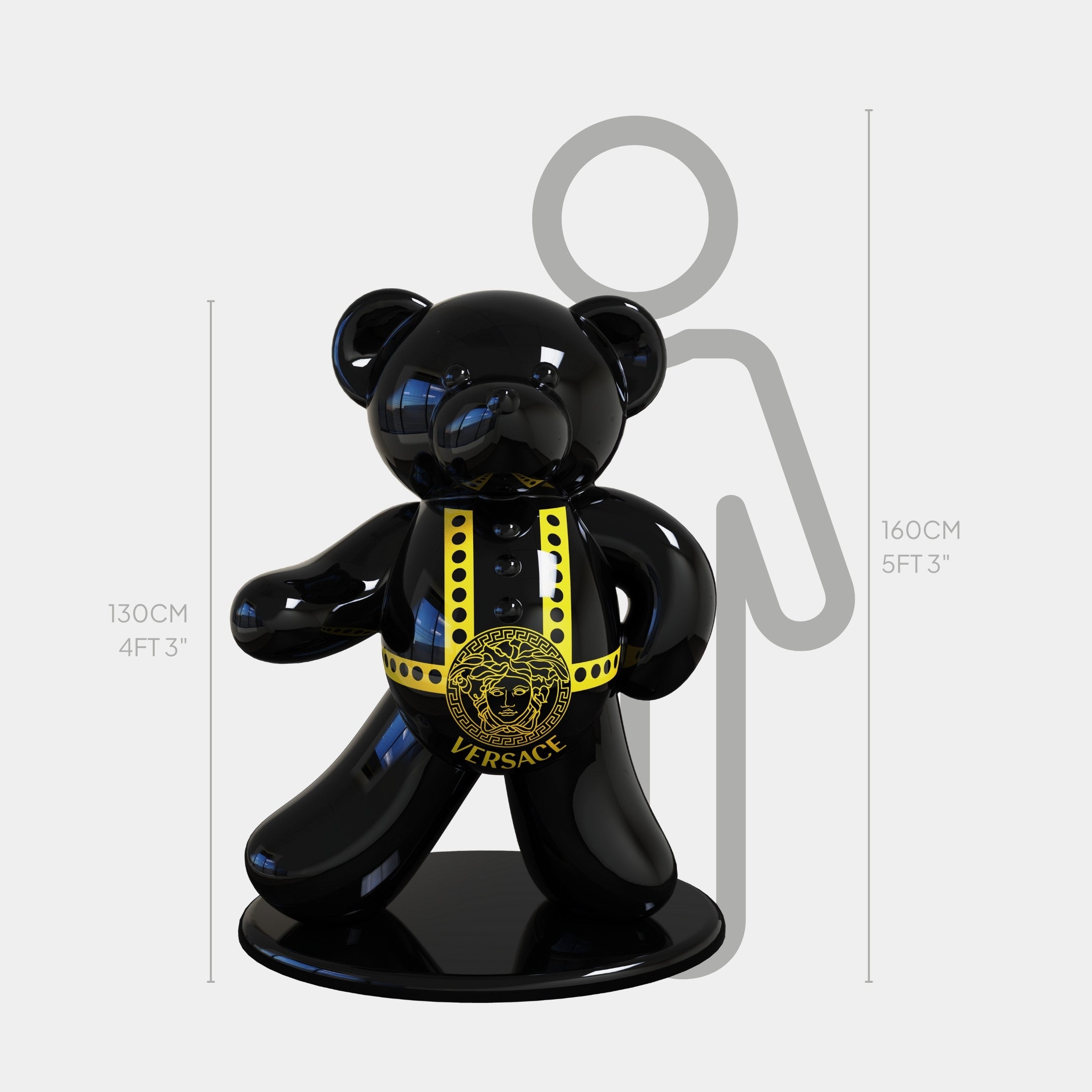 The Gacko Versace Bear Sculpture - 130cm by Giant Sculptures features a glossy black finish, gold medallion, and harness, displayed before a height chart—ideal as a striking pop art piece for luxury interiors.