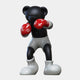 The Gacko Black & Red LV Boxer Bear Sculpture by Giant Sculptures stands 80cm tall in a boxing pose, wearing glossy white shorts and red luxury logo gloves—an eye-catching contemporary pop art piece.