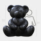 The Gacko Black LV Love Bear Sculpture - 160cm by Giant Sculptures stands beside a human silhouette for scale, showcasing its bold pop art style and Louis Vuitton-inspired design—perfect for contemporary interiors.