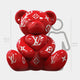 The Gacko Red LV Love Bear Sculpture - 160cm by Giant Sculptures features a glossy red bear with white Louis Vuitton logos. It’s displayed before a height chart with a gray human outline behind it for visual scale comparison.