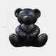 The Gacko Black LV Love Bear Sculpture by Giant Sculptures stands 40cm tall, features a matte black pop art design with embossed LV-inspired logos, and is shown upright against a plain white background.