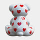 The Gacko Banksy Love Bear Sculpture by Giant Sculptures (160cm) features a glossy white finish, a seated bear shown from the back, and is covered in red hearts—reminiscent of street art style.