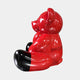 Side profile of the 40cm Gacko Porsche Love Bear Sculpture, showing the seated posture, gloss black paws and the tonal red-on-red PORSCHE wordmark across the flank.