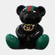 Add designer flair to any space with the Gacko Gucci Love Bear Sculpture - 80cm by Giant Sculptures. This glossy black piece features green and red stripes and a gold GG logo, making it a standout limited edition collectible.