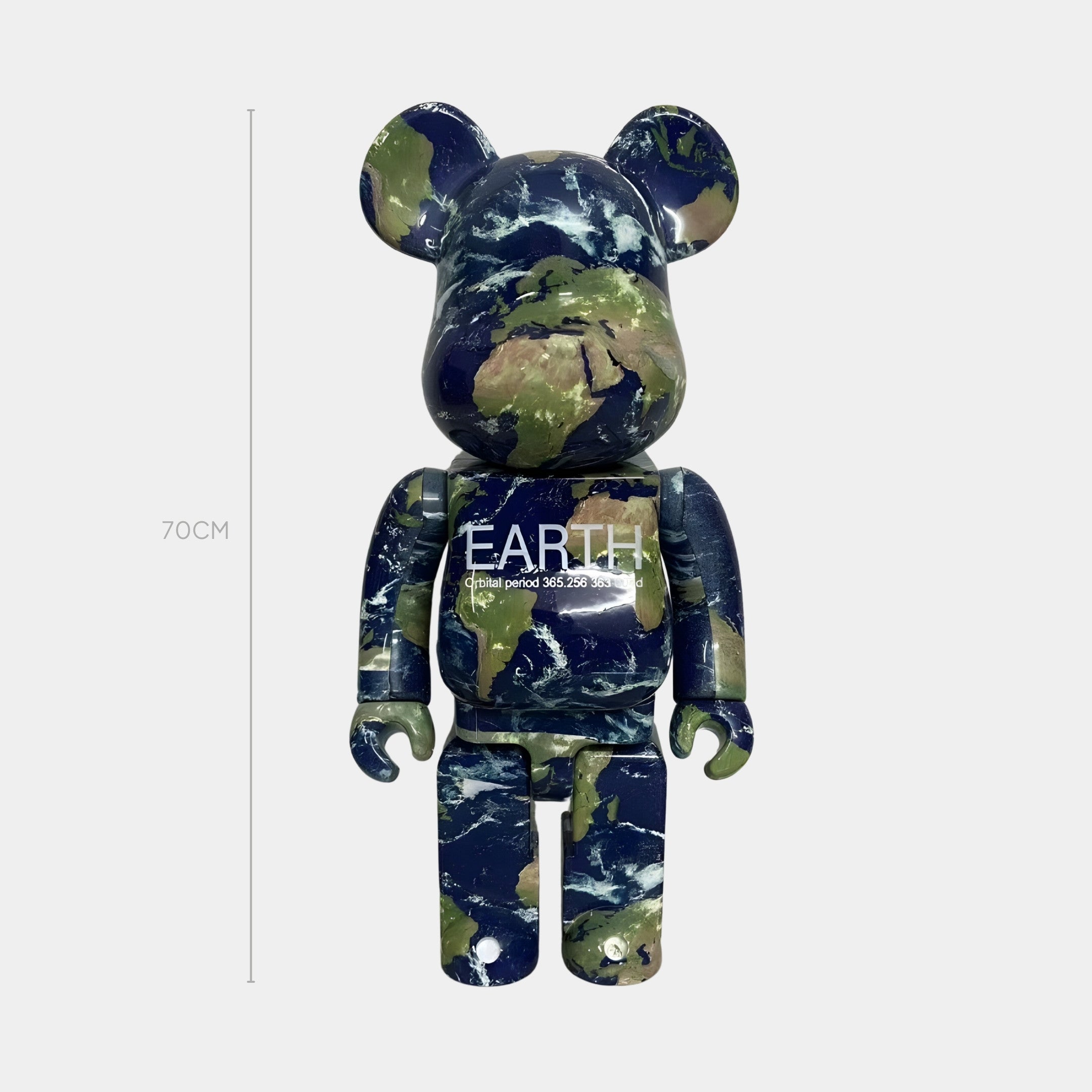 The Global Axis Bear Sculpture - 70cm by Giant Sculptures features high-res satellite imagery of Earths surface, with EARTH and its orbital period on its chest, set against a plain white background.