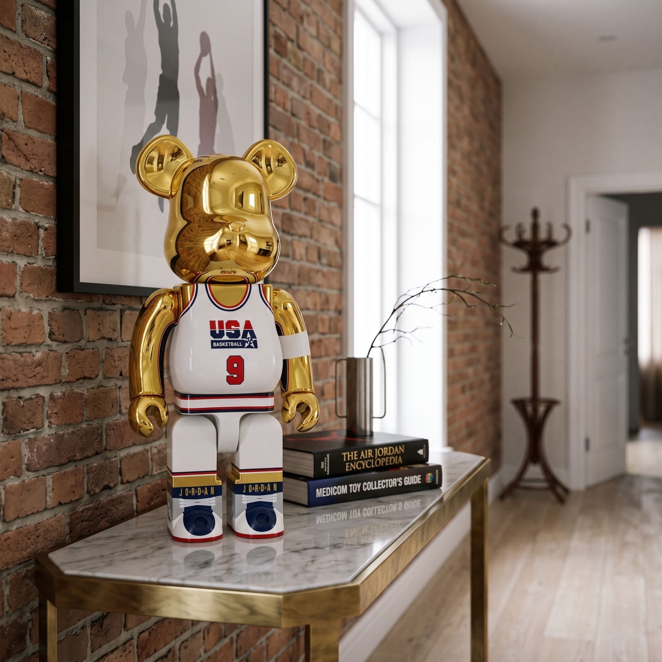 All-Star Gold Court Bear Sculpture, 70cm, gold-finished bear in white USA jersey and shorts, shown on a marble console table in a brick-walled hallway.