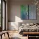 Cirquora Green I Gradient Ripple Diptych Acrylic 3D Wall Art with jade-to-silver-blue ripples mounted above a grey linen bed in a sunlit bedroom.