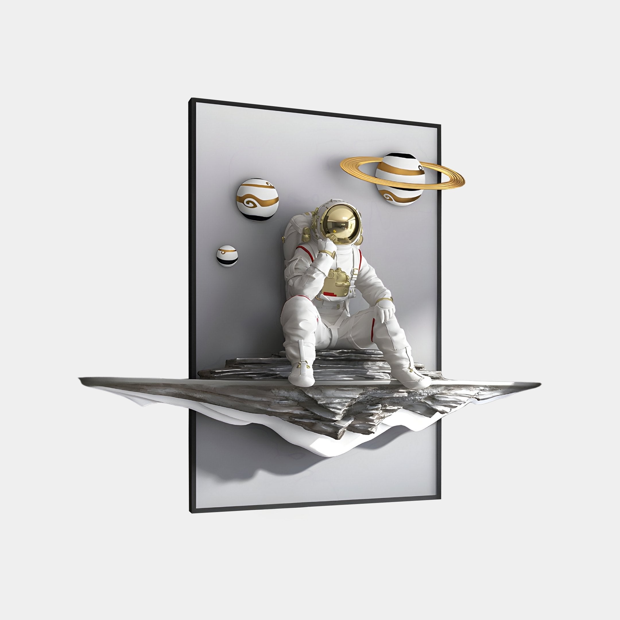 The White 3D Galaxy Astronaut Thinker Wall Art by Giant Sculptures features an astronaut on a floating paper amidst planets with celestial rings. The minimalist gray background encourages cosmic introspection and a surreal space theme.