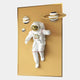 The White 3D Solar Astronaut Golden Portal Wall Art by Giant Sculptures features an astronaut in a white suit before a golden portal, with stylized planets—ideal modern decor for space enthusiasts.