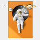 The Giant Sculptures White 3D Solar Astronaut Orange Portal Wall Art showcases an astronaut floating through an orange portal with stylized ringed planets, ideal for adding interstellar decor to your space.
