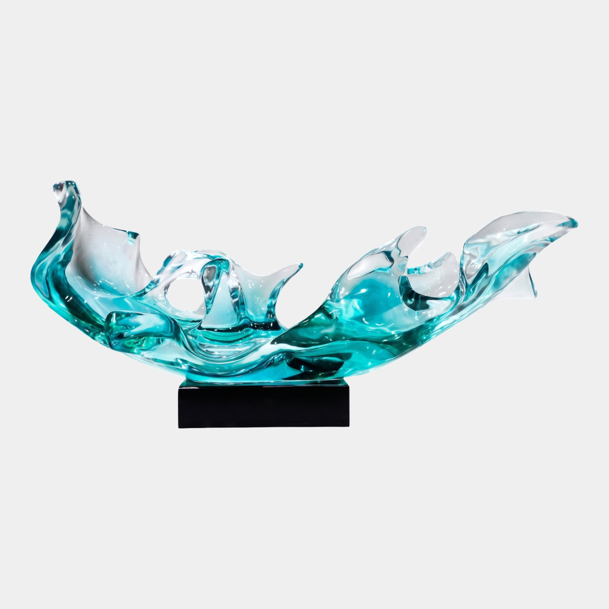 Aqua & Clear Breaking Wave Resin Sculpture - 82cm, curling wave form with a ringed hole and spray crests on a black marble base, shown against a plain white background.