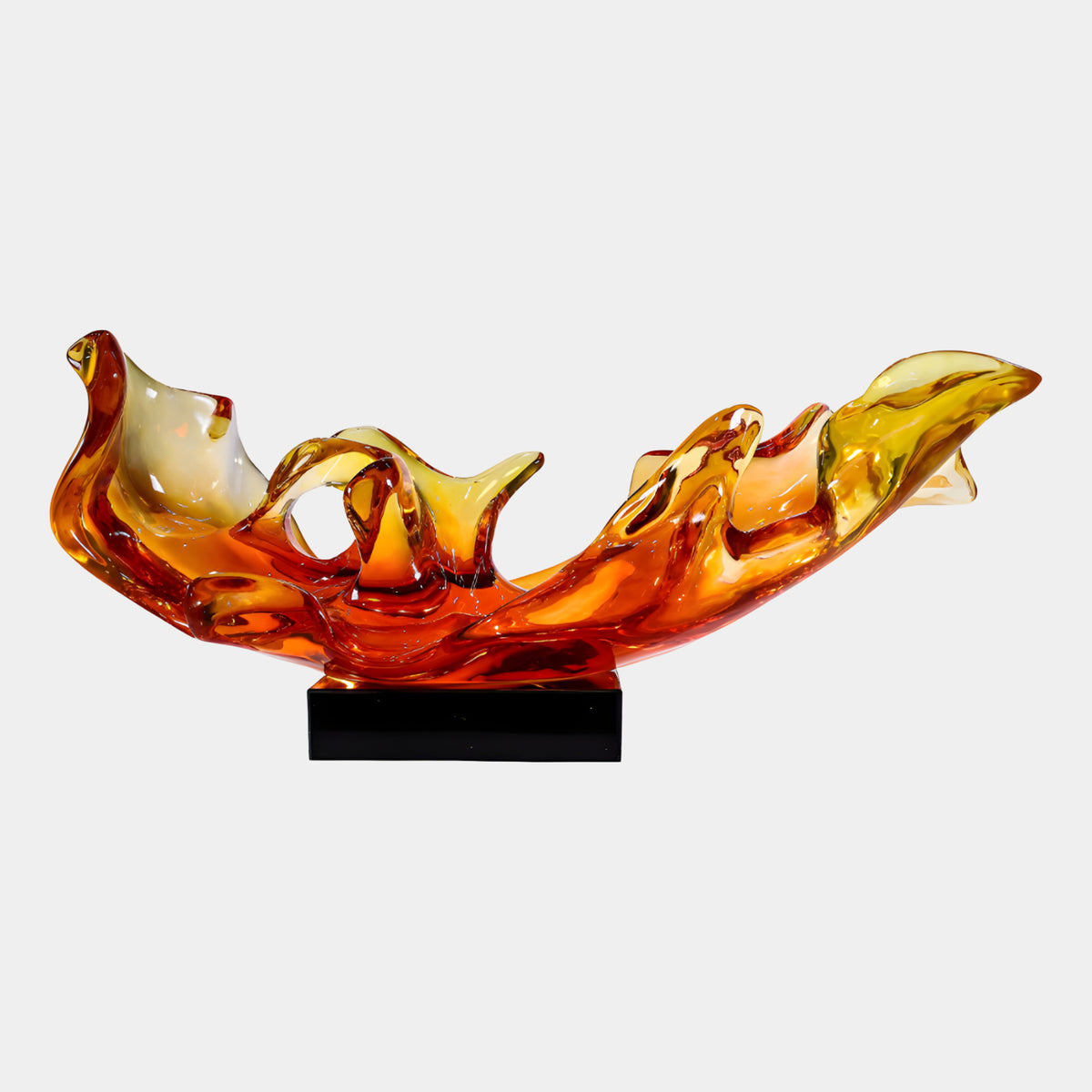 Red & Amber Breaking Wave Resin Sculpture, 82cm, on a black rectangular base, curling and cresting form in red, orange and amber tones, shown against a plain white background.