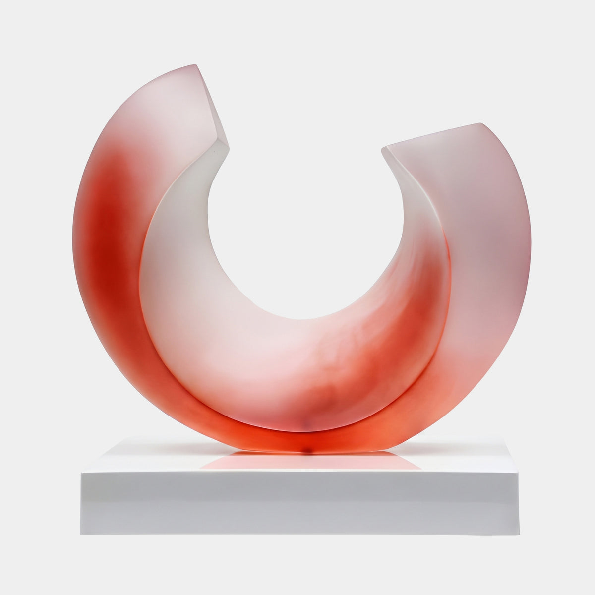 Red & Blush Frosted Open Ring Resin Sculpture, 42cm, open circular form with coral red pooling over soft white frosted resin, on a white base against a plain background.
