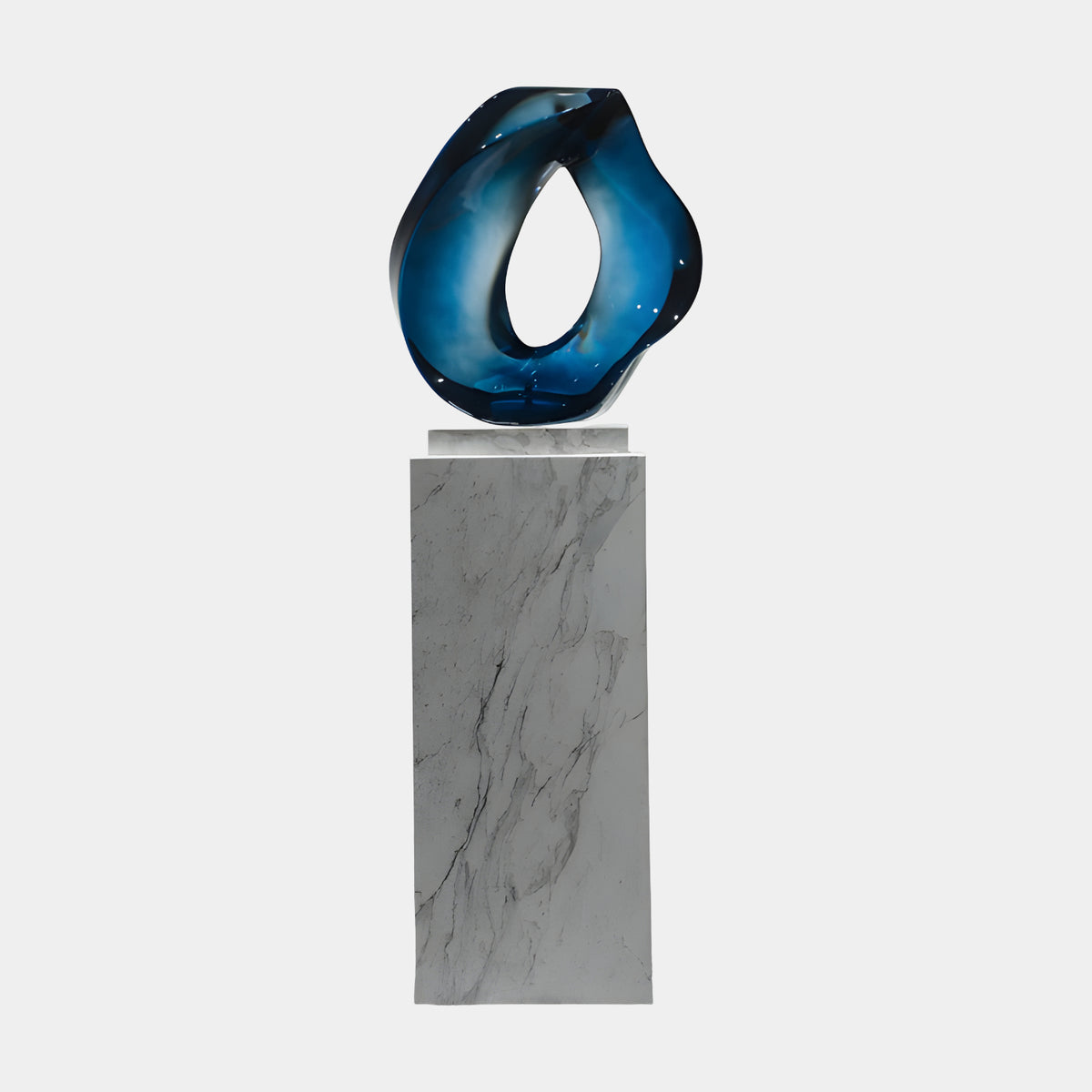 Blue Swirled Ring Resin Sculpture - 51cm, an abstract organic loop in blue and white tones on a veined marble base, set against a plain light background.