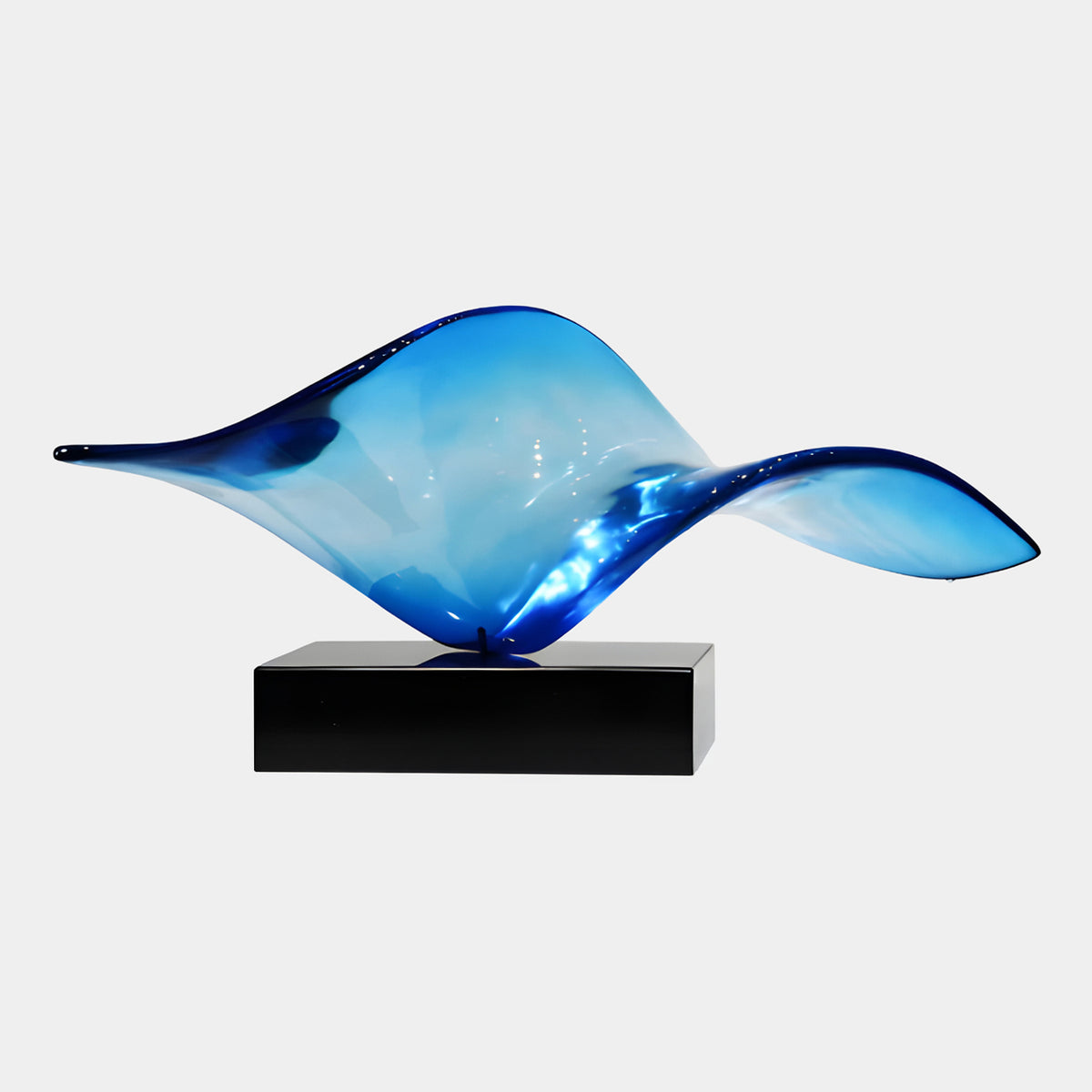 Blue Twisted Sheet on Marble Resin Sculpture - 60cm, a wave-like ribbon form in pale sky blue with deep navy edges, set on a black marble base against a plain light background.