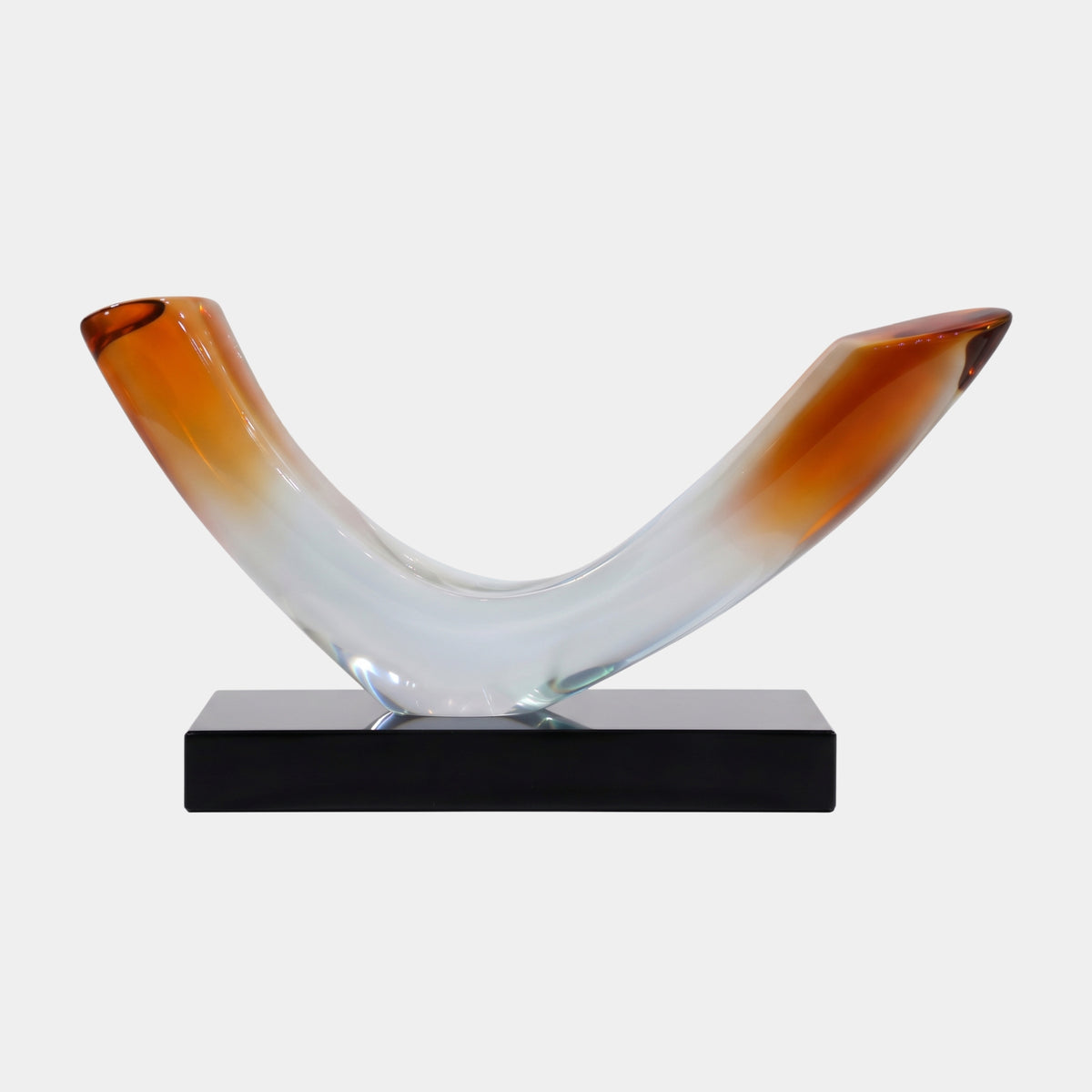 Amber & Clear Graded Bent Horn Resin Sculpture, 48cm, curved V-shaped form fading from amber tips to clear center, on a black rectangular base against a plain white background.