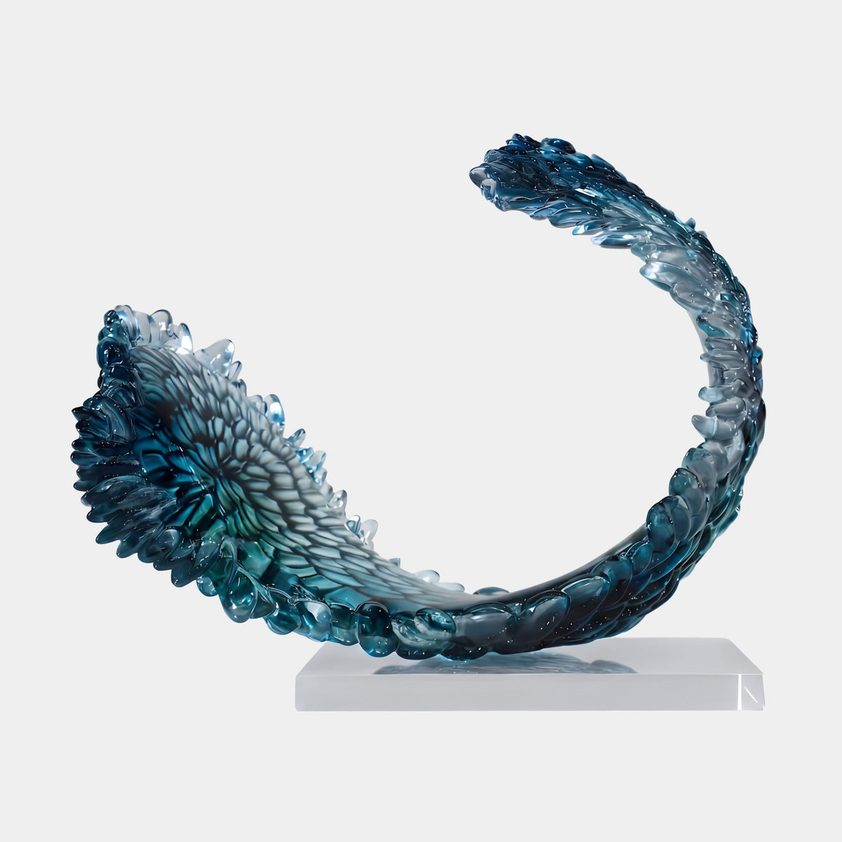 Teal Rosette-Head Scaled Crescent Resin Sculpture, 41cm, curved crescent form with a feathered rosette head tapering to a scaled tail, on a clear acrylic base against a plain white background.