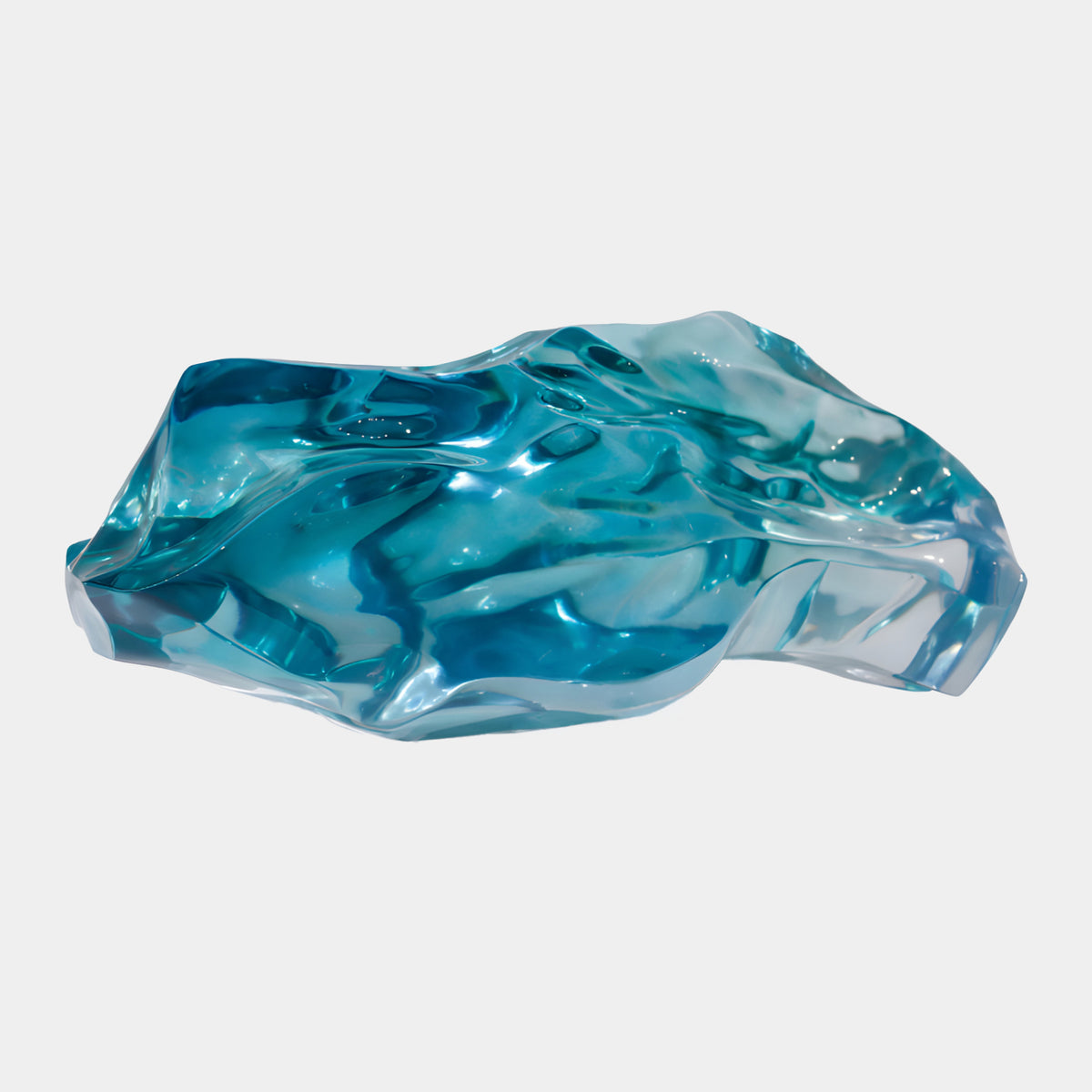 Turquoise Hewn Faceted Mass Resin Sculpture - 70cm, an irregular faceted form with glossy ridges and deep turquoise core fading pale at the edges, shown on a plain white background.