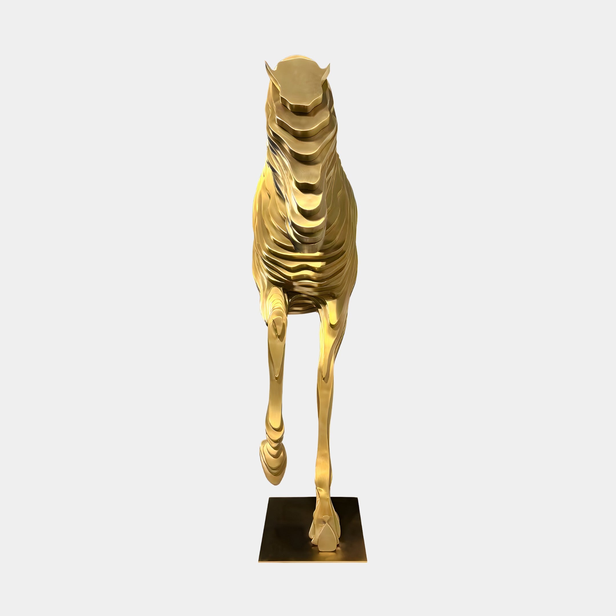The Horse Gold Steel Abstract Sculpture (75/250cm) by Giant Sculptures showcases a layered, abstract gold stainless steel horse on a square base, viewed from the front against a plain white background.