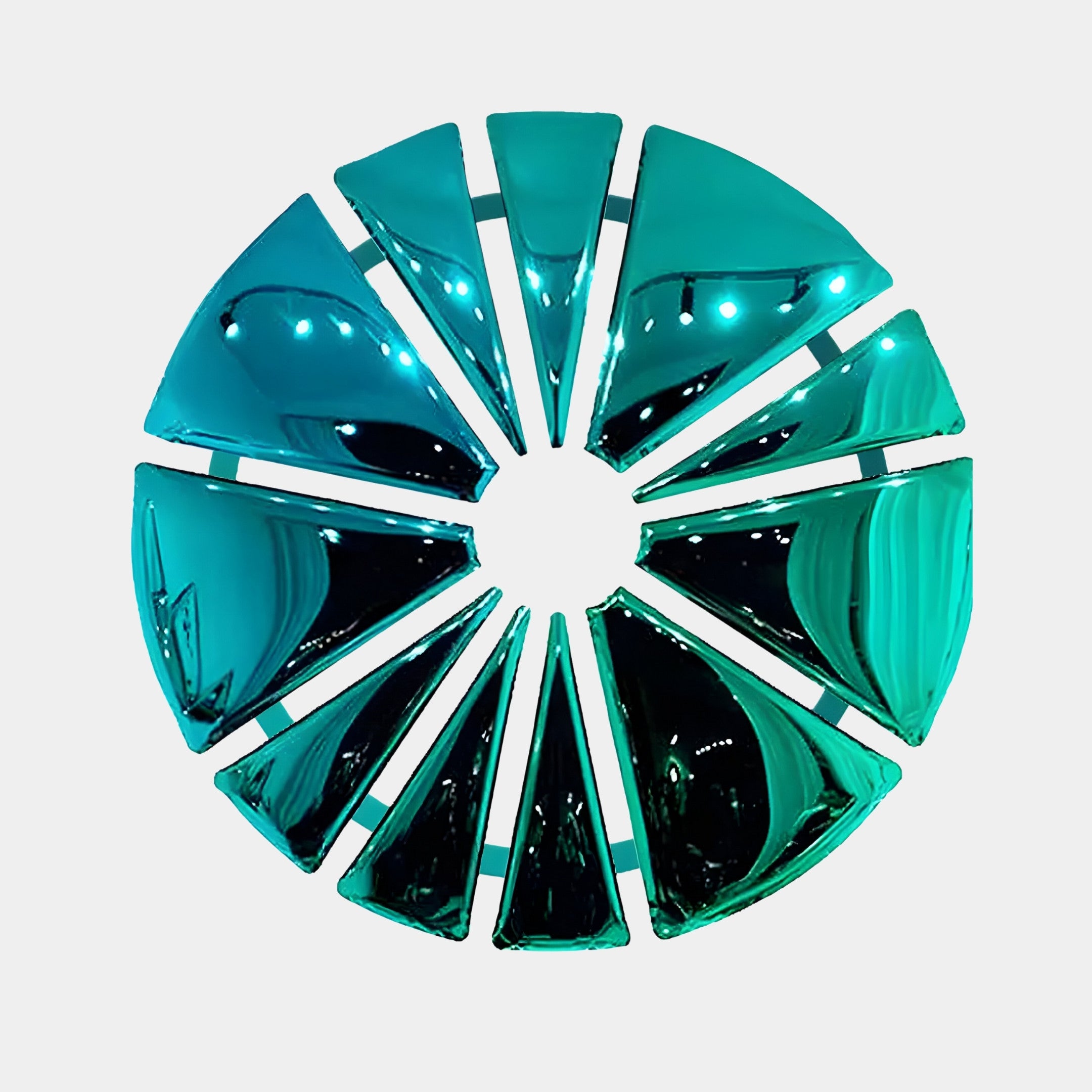 The Halo Teal Segment Circle 3D Metal Wall Art by Giant Sculptures features a dynamic, circular arrangement of reflective, teal triangular panels on a white background, forming a stunning piece with a vibrant teal finish.