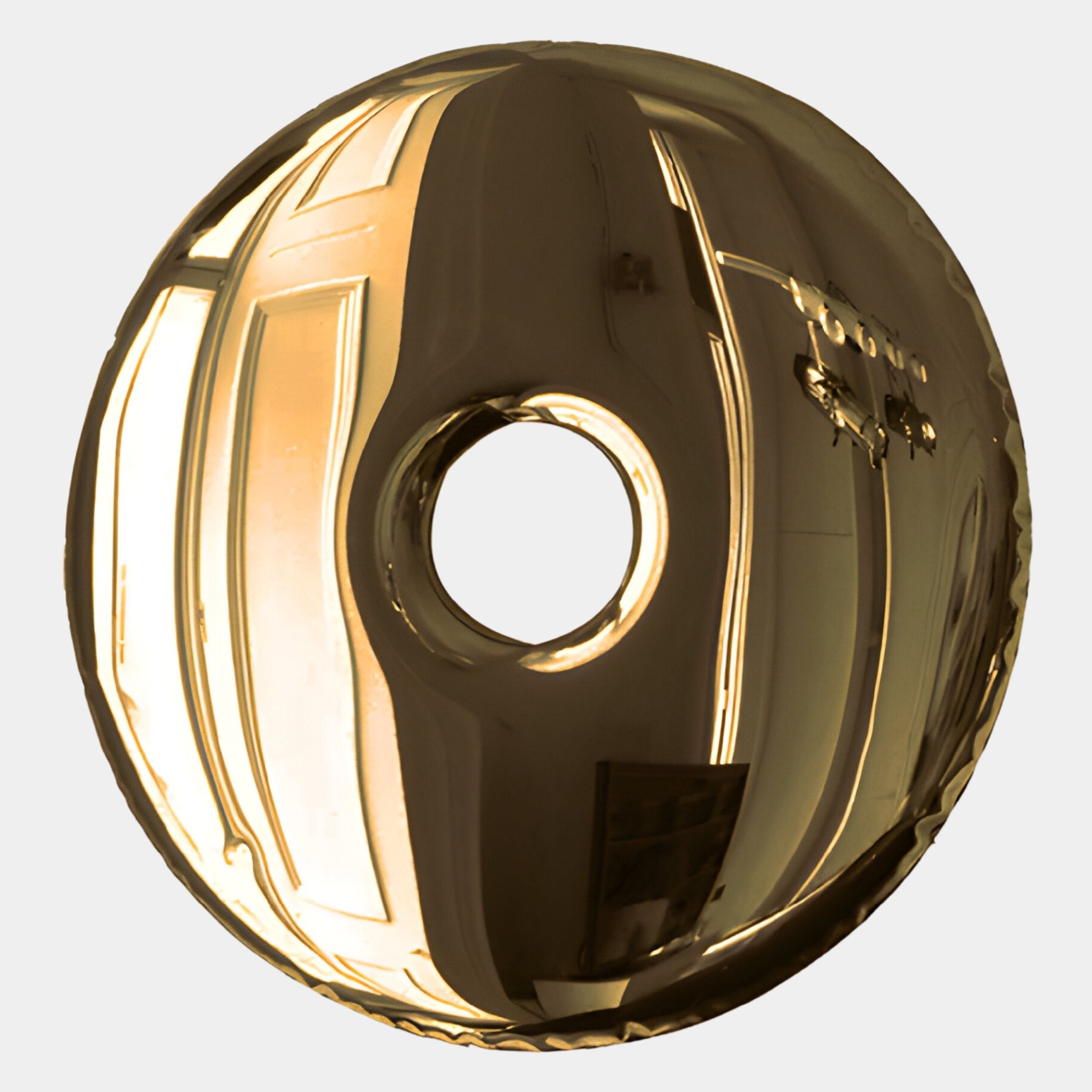 The Auro Gold Round Gloss Metal 3D Wall Art by Giant Sculptures features a shiny, gold, ring-shaped design with a reflective surface that captures room reflections—ideal for adding luxurious style to your interiors.