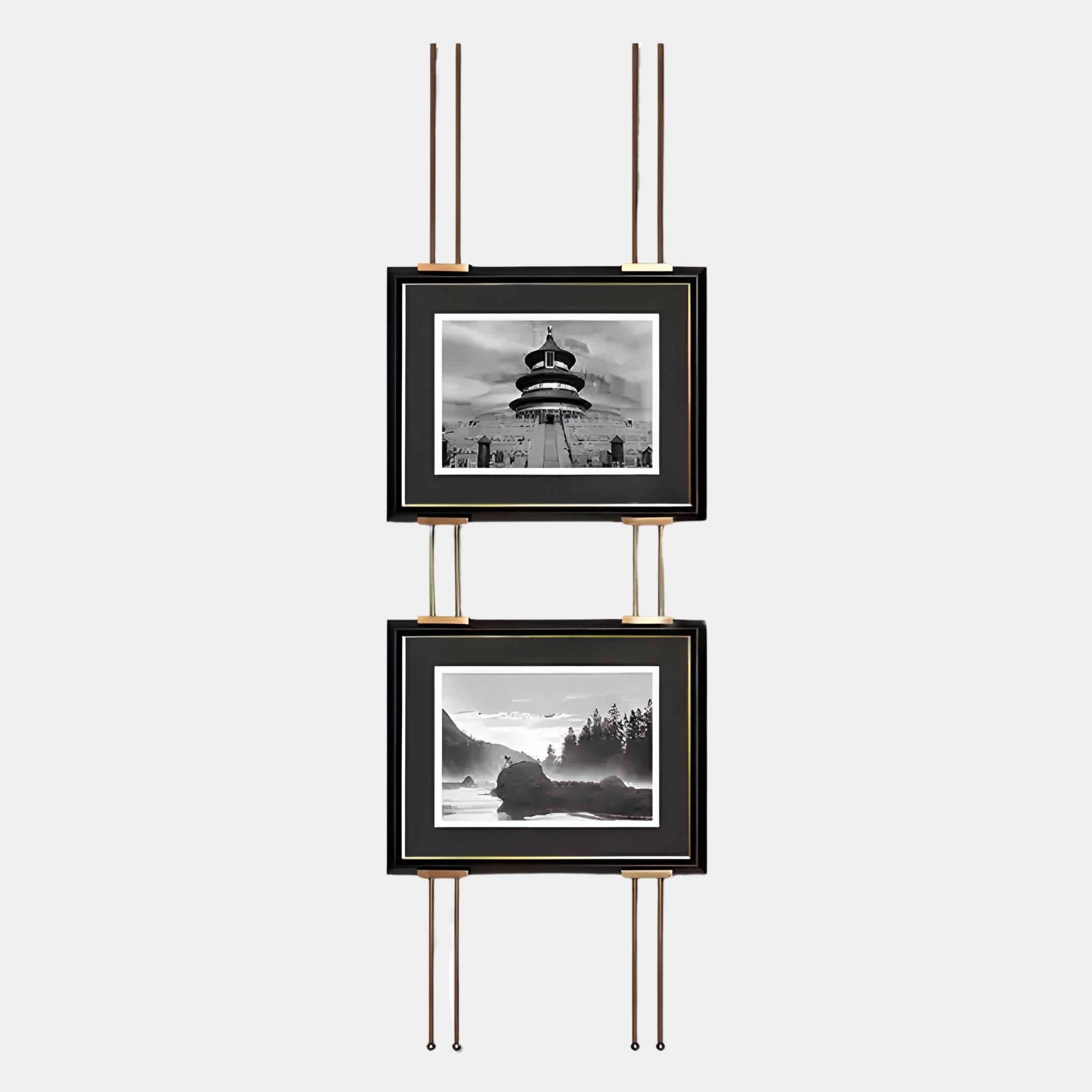 The Imperia Temple and Misty Landscape Dual Frame Metal Wall Art by Giant Sculptures features two black-framed black-and-white photos—temple wall art with a pagoda above, and a misty mountain scene below—on a modern gold and black pole display.
