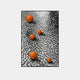 The Luminosa Orange Orb Textured Metal Wall Art by Giant Sculptures features four orange spheres of different sizes on a reflective, wavy metallic surface, embodying modern decor with its unique interplay of color and form.