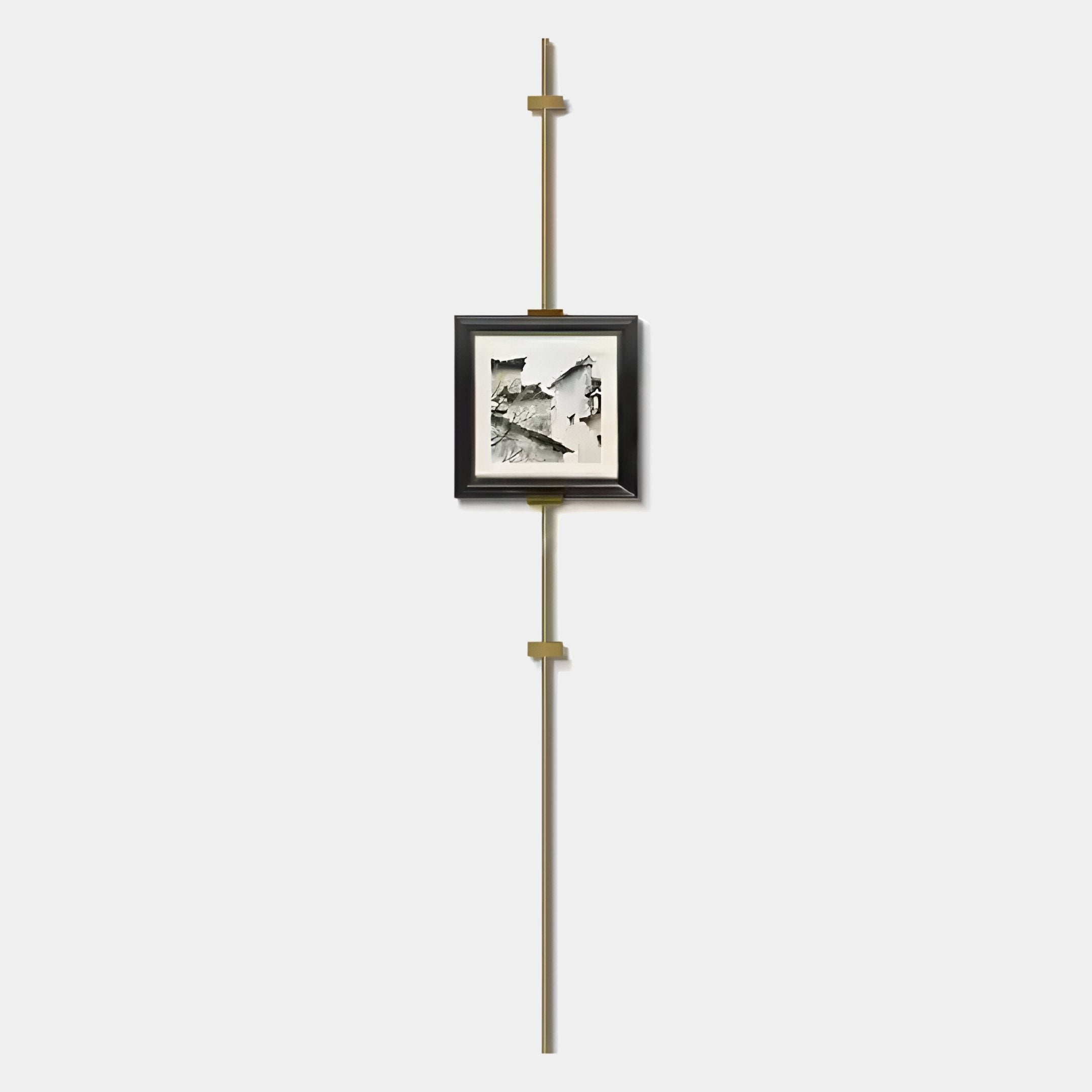 The Ecliptica Fragmented Geometric Gold Frame Wall Art by Giant Sculptures features minimalist black-and-white artwork centered on a tall brass rod with geometric details, displayed against a plain white background.