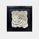 The Harmonia 3D Rose Wall Installation by Giant Sculptures is a ceramic wall sculpture with a spiral design of layered petals. It features a smooth white finish against a black background, framed elegantly in a sleek black square frame.