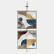The Vortice Abstract Geometry Dual Panel Wall Art by Giant Sculptures features geometric blue, gold, white, and brown squares. Gold frames and a central rod connect the panels, creating an elegant look against a light gray background.