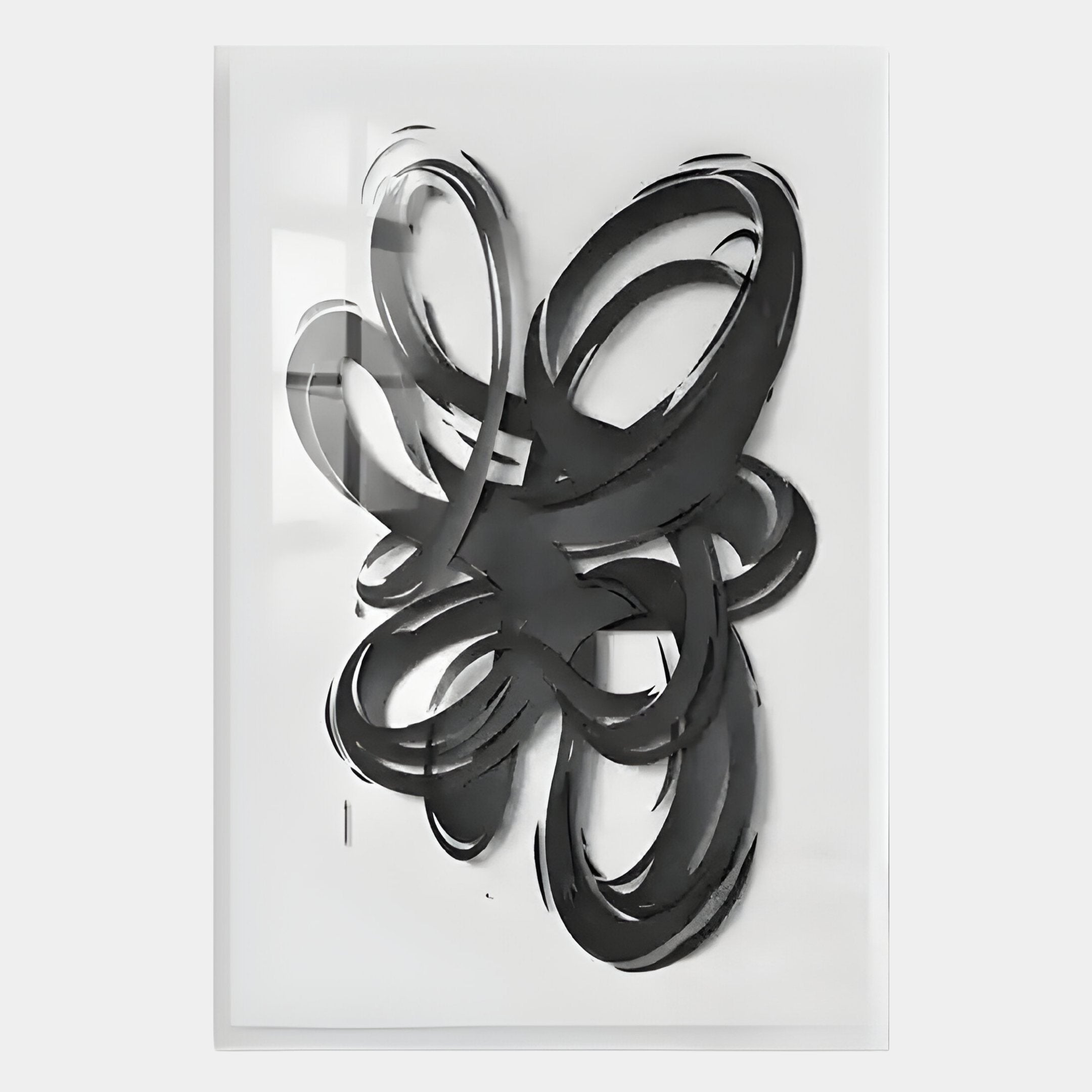 The Zephyr Black Cascade Abstract Metal Wall Art by Giant Sculptures features overlapping black brushstroke loops on white, creating a modern, dynamic sense of movement and depth.