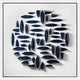 The Elysian 3D Ceramic Wall Art by Giant Sculptures features a circular arrangement of elongated, organic navy blue elements, creating subtle shadows—an ideal statement piece for contemporary interiors.