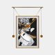 The Eterna Classics Athena Replica Portrait by Giant Sculptures features a stylized, partially obscured classical sculpture in black and white with gold accents, beautifully framed as golden frame wall art and suspended by an elegant mechanism with gold spherical weights.