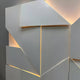 The Prisma White Geometric Panel 3D Wall Art by Giant Sculptures features overlapping white panels with warm ambient lighting. This minimalist decor offers a striking abstract geometric effect and sophisticated visual appeal.