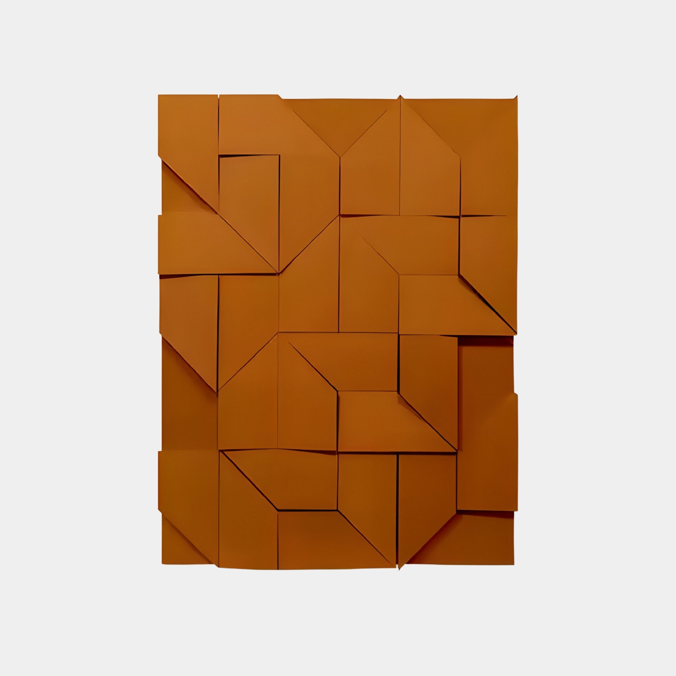 The Prisma Orange Geometric Panel 3D Wall Art by Giant Sculptures showcases interlocking, copper-colored shapes on a light gray background, creating an architectural illusion of depth and texture through varying angles and shadows.