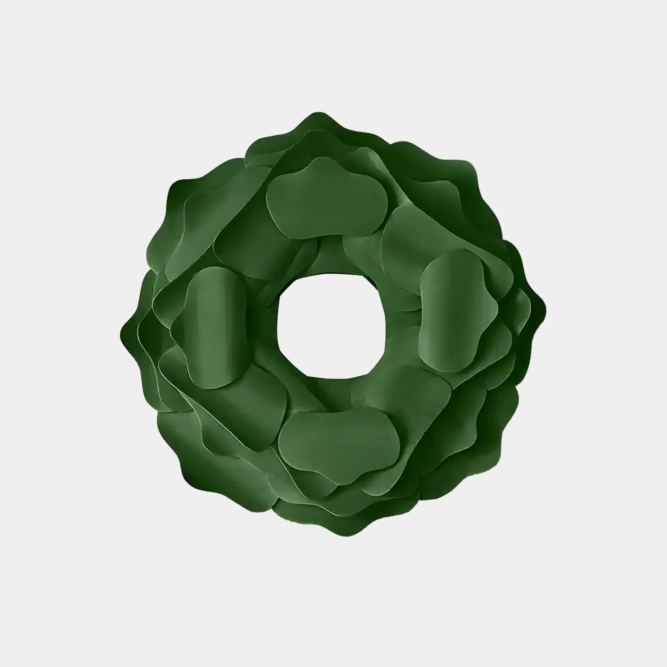 The Sculptura Mirror Forest Green Floral Round Metal Wall Art by Giant Sculptures brings decor to life with its abstract, scalloped circular design resembling a metal floral wreath on a white background.