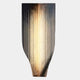 The Celestial Gold Radiance Curved Vertical Abstract Metal Wall Art by Giant Sculptures features a tall, sleek design with glossy golden and white streaks—an eye-catching piece ideal for contemporary interiors and dark backgrounds.